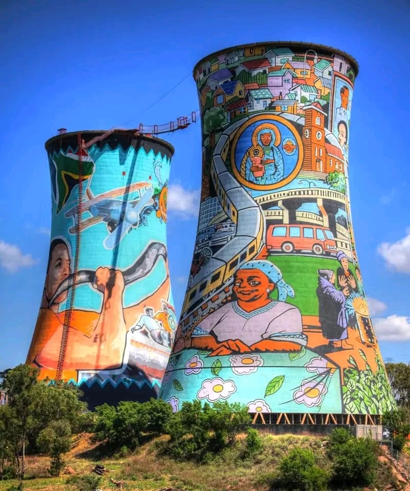 The iconic and colorfully painted Orlando Towers in Soweto, a landmark for tourism and adventure sports.